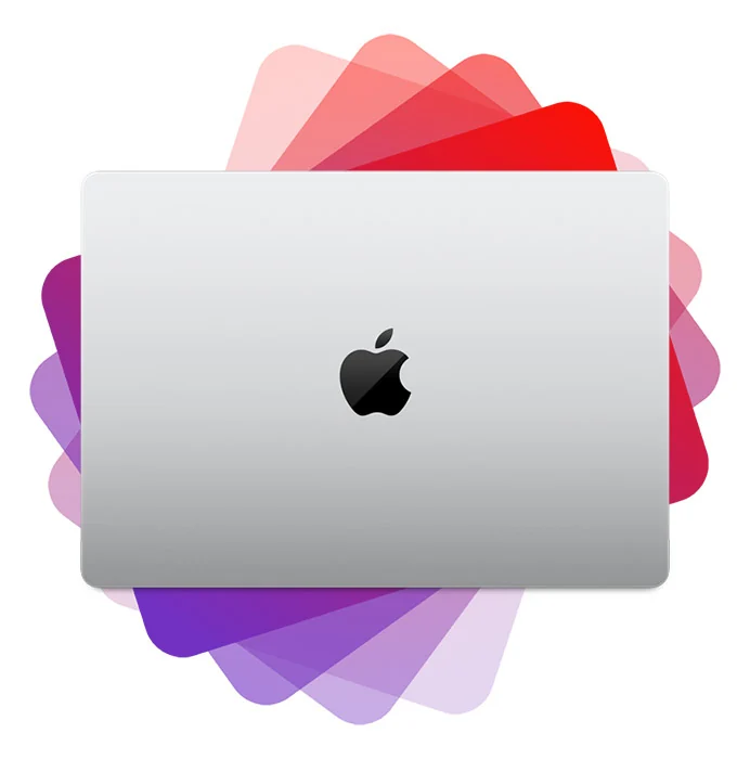 MacBook cerrado sobre un fondo de colores